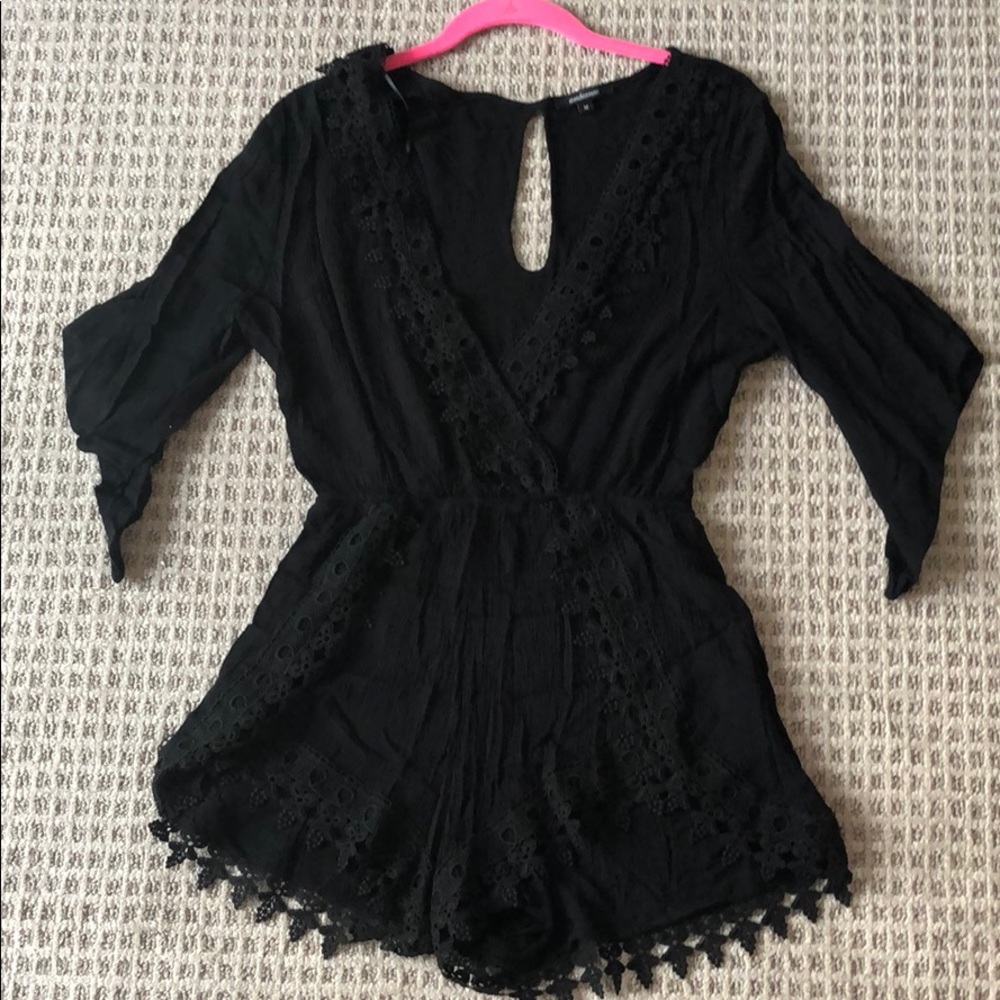Black v neck romper with lace detail